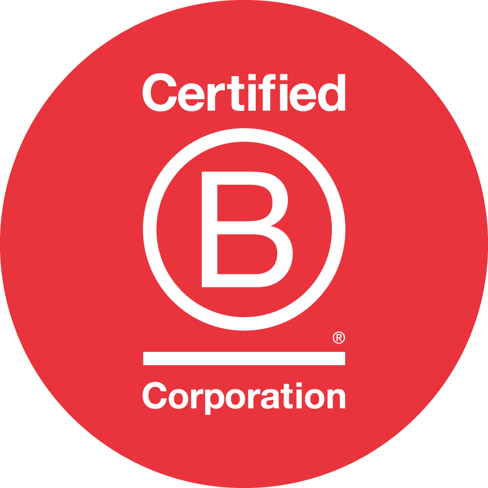 The image shows a red circular logo with the text "Certified B Corporation" and a large white letter "B" in the center, indicating a certified B Corp.