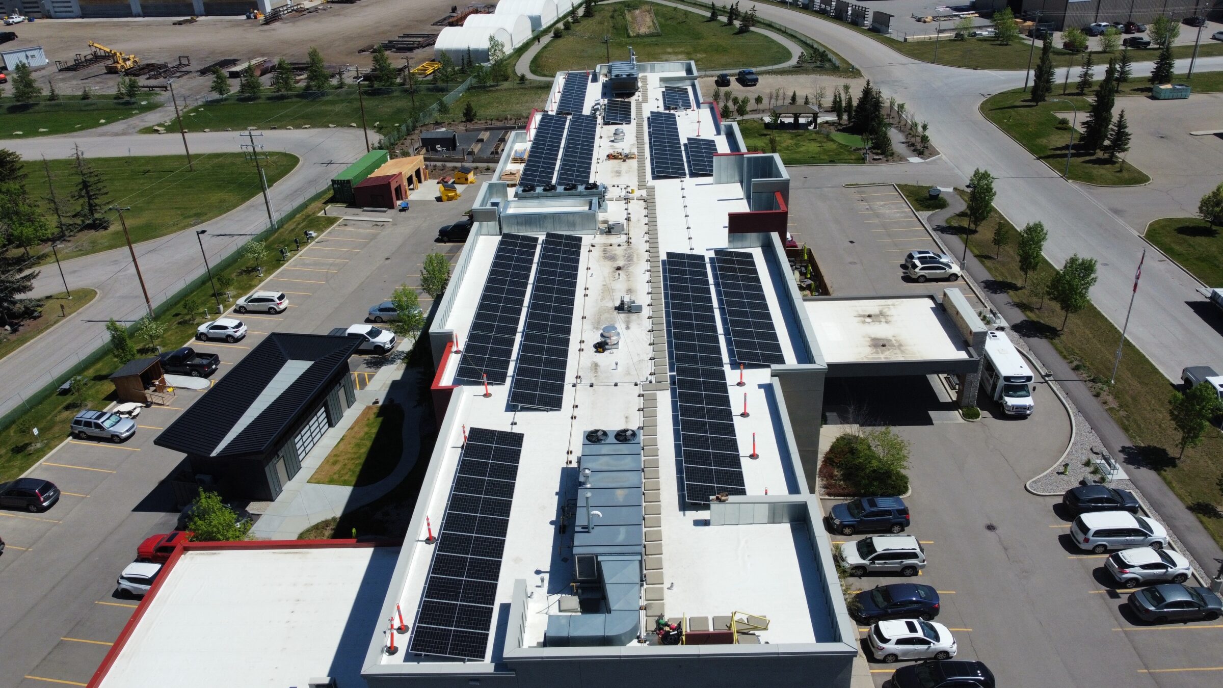Repurposed old hotel turned into a senior living facility with solar modules on the roof.